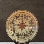 Nature-inspired design on Plate in Kashmiri Paper Mache